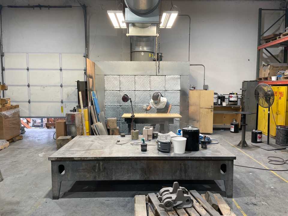 Adam Spraying Polyurethane on my new Desk Top