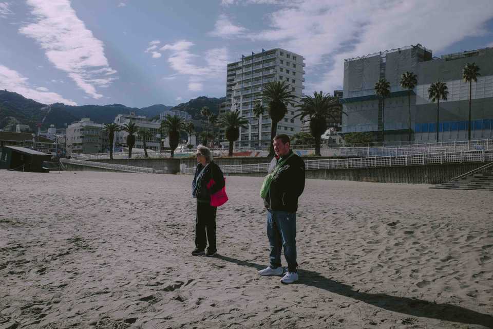 James and Mom surveying the beach at Atami