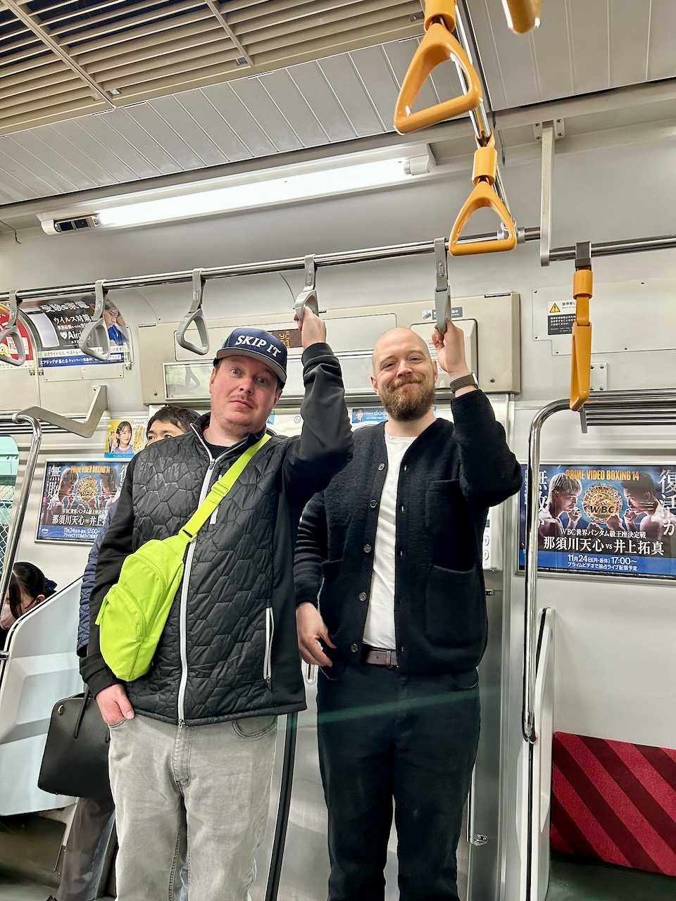 James and I on the Tokyo Metro as taken by Mom