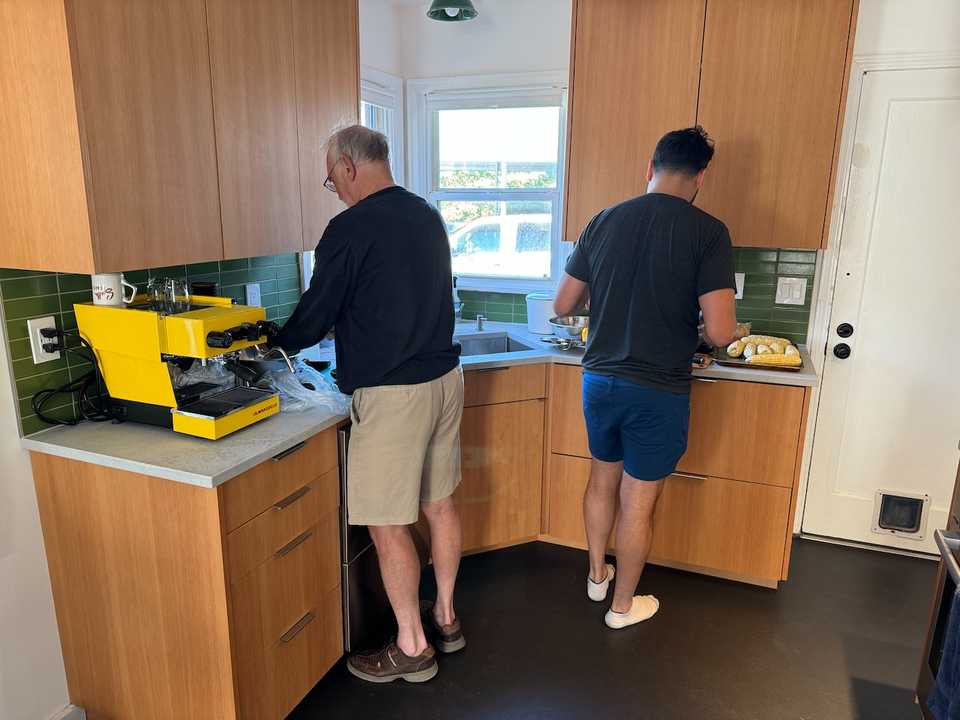 Chuck and Charlie making dinner